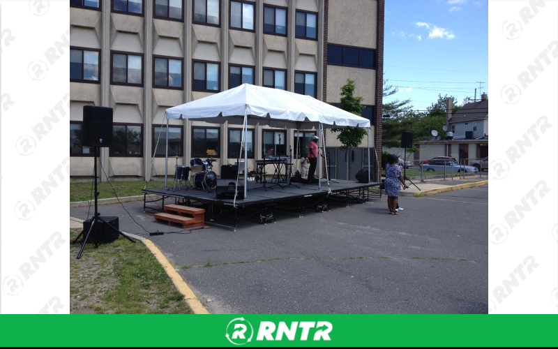 Generic 10x20 Tent with 3 pieces of stage – For rent in howell, new-jersey – Mr. Happy Party Rentals | RNTR.com – Image 1
