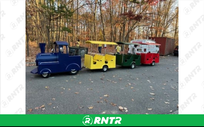 Generic Santa with The Happy Express with Holiday Lights! – For rent in Howell, New Jersey – Mr. Happy Party Rentals | RNTR.com – Image 2 of 2