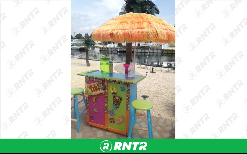 Generic Tiki Bar w/2 stools & umbrella (weather permitting) – For rent in howell, new-jersey – Mr. Happy Party Rentals | RNTR.com – Image 1
