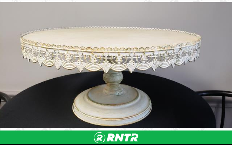 Generic ANTIQUE WHITE 22 RD. CAKE STAND – For rent in Mount Airy, North Carolina – Cooke Rentals MA | RNTR.com – Image 1 of 1