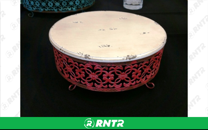 Generic METAL 12 RD. CAKE STAND-PINK – For rent in Mount Airy, North Carolina – Cooke Rentals MA | RNTR.com – Image 1 of 1