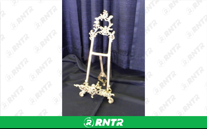Generic TABLETOP EASEL - BRASS – For rent in Mount Airy, North Carolina – Cooke Rentals MA | RNTR.com – Image 1 of 1