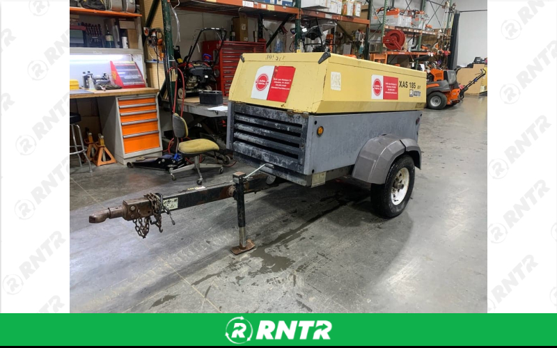 Generic Towable Air Compressor - Hose Seperate - 185 CFM - 2 Ball - Yellow – For rent in allendale, michigan – Allendale Ace | RNTR.com – Image 1