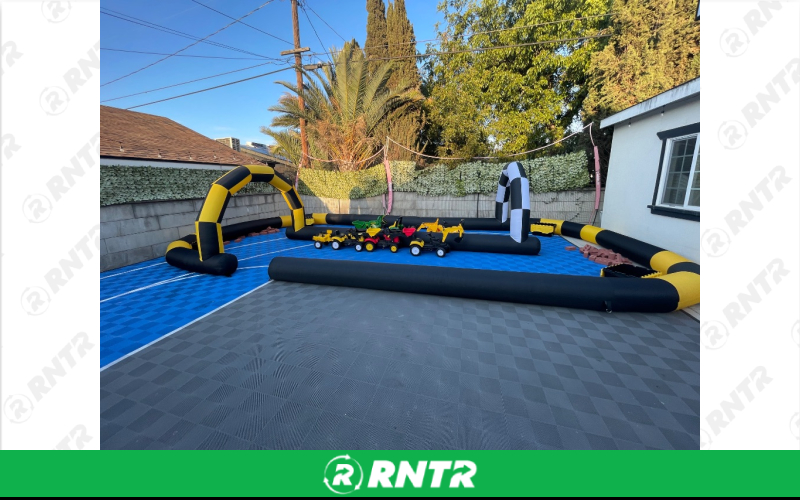 Inflatable Construction track theme with ride on vehicles Inflatable Construction track theme with ride on vehicles – For rent in anaheim, california – Race Track Inflateables | RNTR.com – Image 1