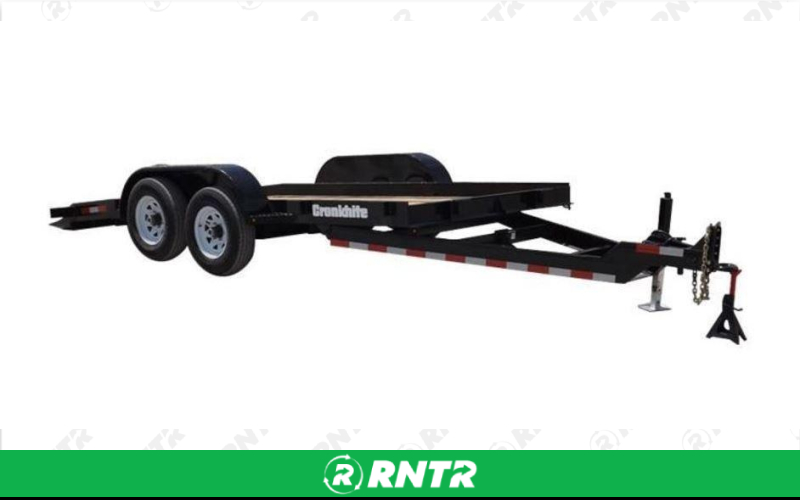 CRONKHITE INDUSTRIES -  INC. TRAILER -  TILT 2-5/16 BALL 9900GVW -  8000# 12'x6'6 CARRY CAPACITY -  BLACK -  SURGE BRAKES  -  DUAL AXLE 2-5/16 BALL – For rent in ontario, new-york – Altra Rental | RNTR.com – Image 1